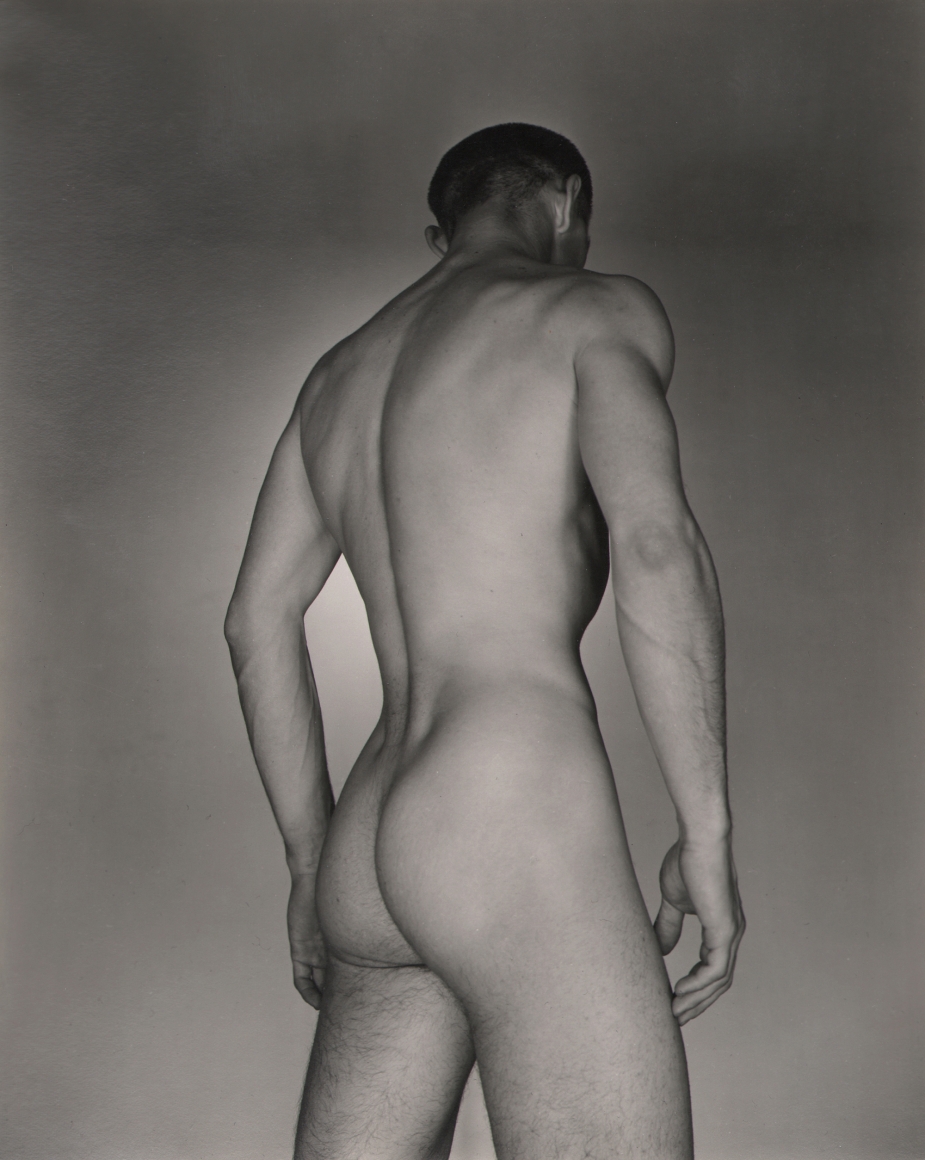 George Platt Lynes, Ted Starkowski, ​c. 1950. Male nude photographed from behind and below.