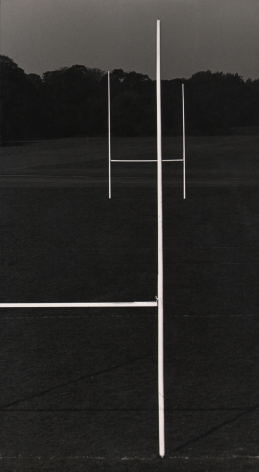 12. Michael O'Cleary, Winner, c. 1955–1961. Dark landscape with the frame divided by white goal posts.