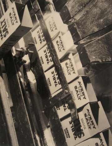 Harold Haliday Costain, Filling Cartons, Island Salt Co. Brand, Avery Island, Louisiana, 1934. A machine fills "Avery Table Salt" boxes with salt.