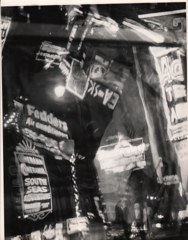 6. David Attie, Times Square, ​1958. Abstract, distorted composition of neon signs in Times Square.