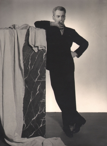 Jared French, George Platt Lynes, c. 1935. Full-body studio portrait with Lynes leaning against a shoulder-height block.