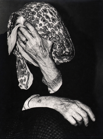 08. Mario Giacomelli, Verrà la morte e avrà i tuoi occhi, 1966–1968. High contrast image. Seated woman covers her face with a hand and kerchief.